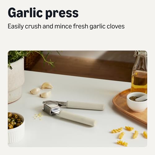 Amazon Basics Garlic Press, Stainless Steel Garlic Mincer & Crusher with Soft-Grip Handle, Dishwasher-Safe, Linen Gray - Image 2