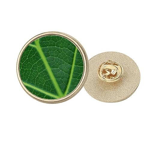 Broche ronde en métal doré et vert nature : l'élégance d'un bijou artisanal en taille M