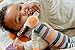 Pebble Fair Trade Handmade Crochet Cotton Bunny Rattle - Multi