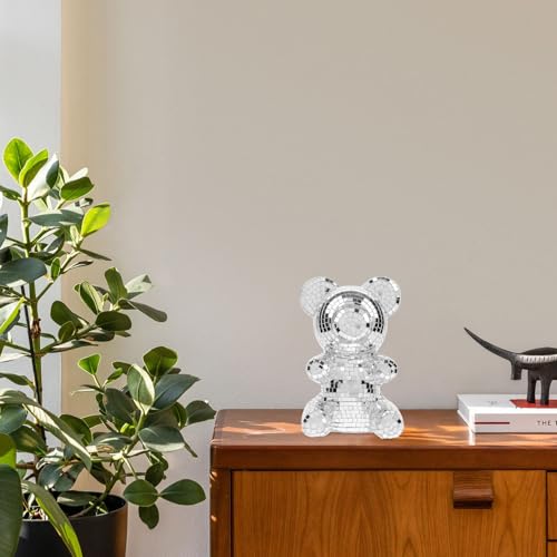 Ours disco en verre réfléchissant pour égayer un bureau sombre