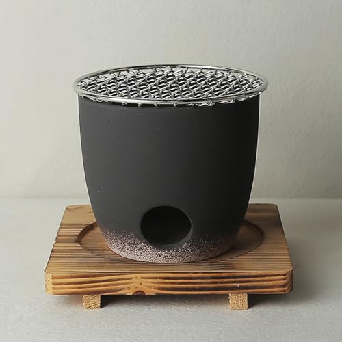 Design séparé pour ce poêle à charbon argile avec grille et patins bois
