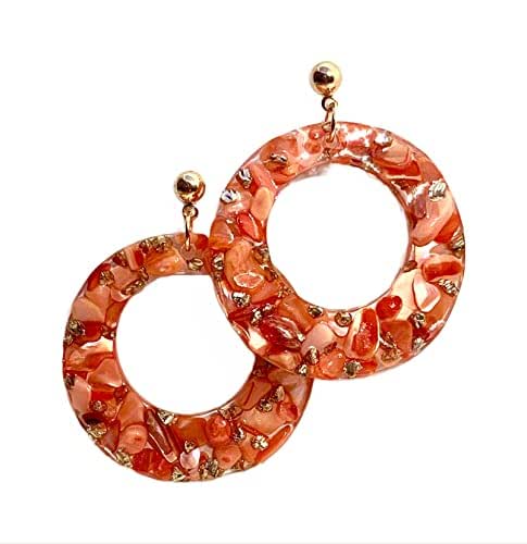 Boucles d'oreilles élégantes nacrées violettes design captivant pour les amat
