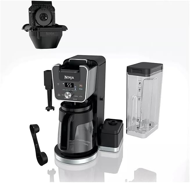 A person using the built-in frother on the Ninja DualBrew PRO XL to froth milk in a mug.