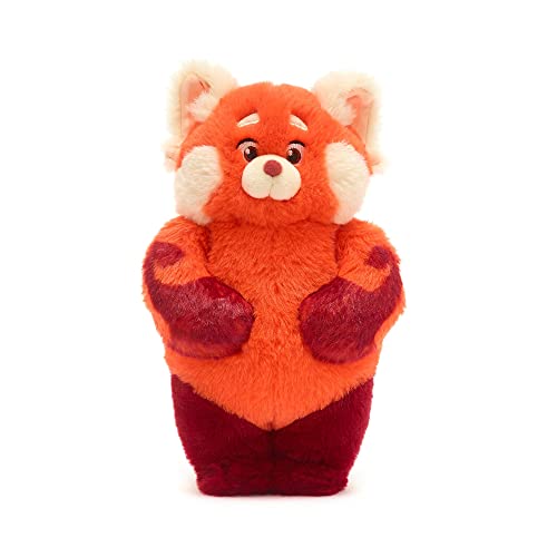 Peluche con accessori: questo peluche di Mei Lee presenta il suo zaino rosa con stemmi e toppe stampate in modo intricato.