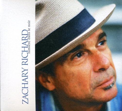Lumiere Dans Le Noir [Audio CD] Zachary Richard; Freddy Koella; Mike Dillon; Stanton Moore; Wynton Marsalis; David Torkanowsky; Denis Courchesne; Francis Fillion; Michel Pepin; Denis Benarrosch; Eric Sauviat; Herv Pouliquen; Sylvain Quesnel; Herve Legeay; St phane Sanseverino; Bill Dillon and Francis Cabrel