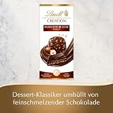Lindt Czekolada Creation orzech laskowy de Luxe drobnoziołowy, 150 g, chrupiące kawałki orzecha laskowego w kremowym wypełnieniu otoczonym drobną cierpliwą czekoladą, tabliczka czekolady, prezent z czekolady