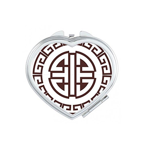 Mignon petit cadeau portable miroir de poche rond aux symboles traditionnels d'art