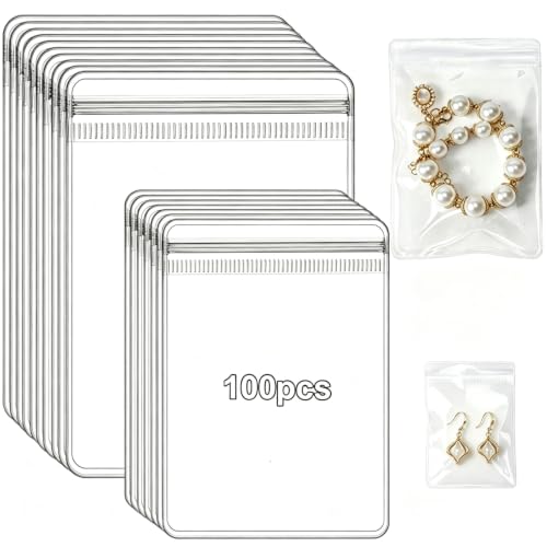 AISHN 100pcs Jewelry Bags Clear Plastic Sturdy PVC Anti Tarnish Jewelry Bags Travel Jewelry Organizer for Rings & Earrings Plastic Bags for Jewelry - 2 Sizes (2.76 * 3.94 in & 3.54 * 5.12 in)