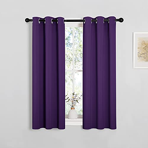 Image of NICETOWN Thermal Insulated Blackout Draperies Curtains, Triple Weave Home Decoration Solid Ring Top Blackout Drape Panels for Bedroom (Set of 2, 29 x 45 Inch, Royal Purple)