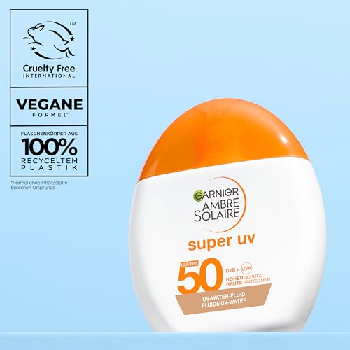 Garnier Ambre Solaire Super UV UV-Water-Fluid LSF 50 – Getönte Sonnencreme für das Gesicht – 12h Frische & Dry-Touch Effekt – Zieht schnell ein, strahlender Glow & nicht fettend – 40ml
