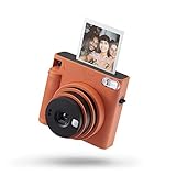 La caja incluye: cámara instax SQ1, 2 x CR2 pilas de ion litio, correa de mano, manual usuario, punto de apoyo de goma para empuñadura