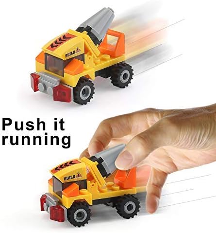 A hand pushing a built construction truck, illustrating its push-and-go feature.