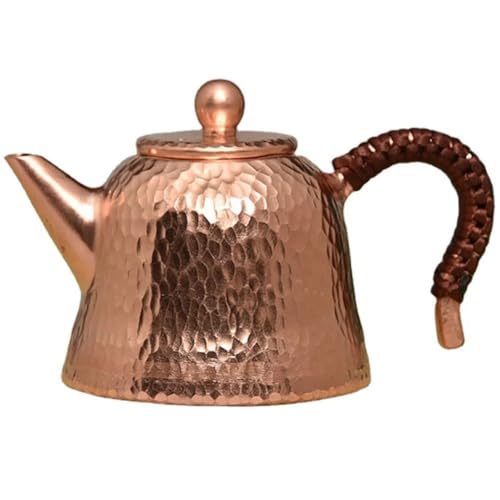 Théière en cuivre martelé artisanal pour une pause thé d'exception