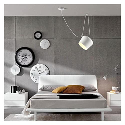 Lustre suspension rétro LED en aluminium pour illuminer chaleureusement votre salle à manger
