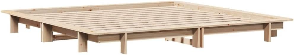 Assembled bed frame without mattress, showing the slatted base from an angle.