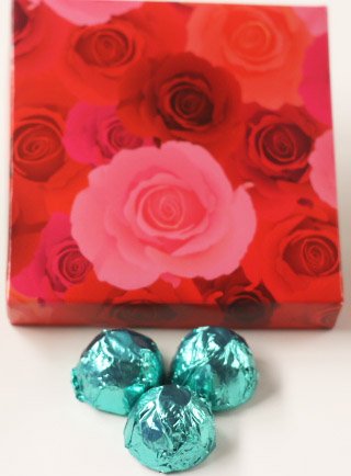 Scotts Cakes Milk Chocolate Orange Marzipan Candies with Aqua Foils in a 1 Pound Pink Roses Box