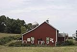 Photo- Although Amish people traditionally eschew all forms of ostentation, this family's barn near Pigeon Falls in Trempealeau County, Wisconsin, displays several'barn quilts 12in x 08in