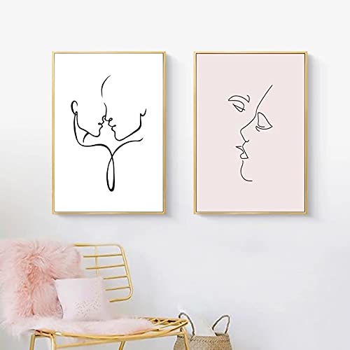 Cuadros de línea abstracta de pareja para decorar un dormitorio matrimonial estilo nórdico