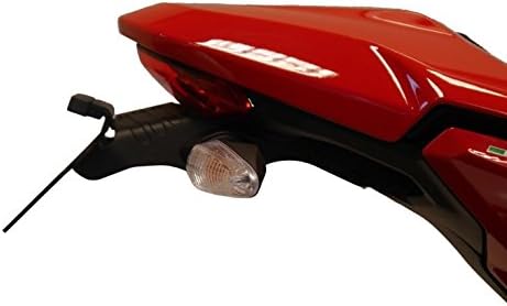 lateral view of a red Ducati Monster motorcycle with the Evotech Performance fender eliminator installed, showing a clean, minimalist rear end.