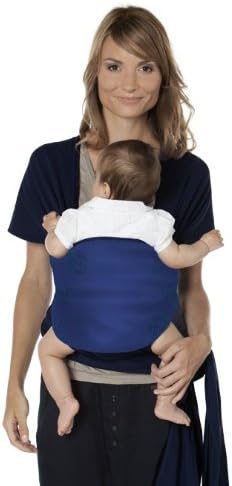 Parent with baby in a front-carry, inward-facing position, showing full body support.