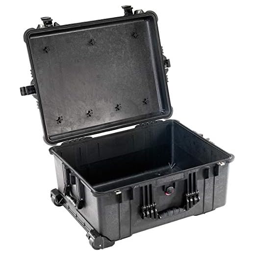 PELI 1610 Maleta técnica estanca con ruedas para el transporte de equipos fotográfico y drones, IP67 estanca e impermeable al polvo, 62L de capacidad, fabricada en Alemania, sin espuma, color negro