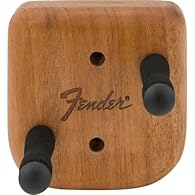 Showcase your Telecaster with the Level-Up Wall Hanger. Crafted from mahogany-finished wood, this uniquely shaped hanger features offset dowels to securely suspend your guitar. Designed to ensure straight hanging, the offset dowels are positioned pre...