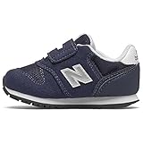 Fabricado en Indonesia NEW BALANCE IZ373WN2 Evergreen, Zapatillas de Deporte Casual para Niños, Azul, EU 24