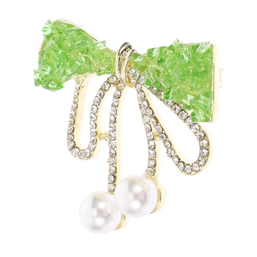 Broche strass verts rétro pour accessoiriser une veste ou un chapeau lors d'un mariage