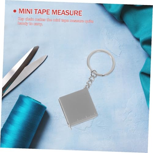 Cinta métrica mini retráctil con llavero 1m metálica miniatura 7
