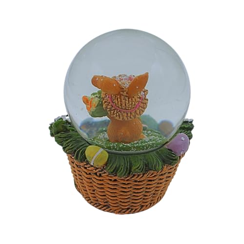 Dekohelden24 Schüttelkugel, Oster - Schneekugel, Schneekugel mit Osterhase, Osterhase im Korb, Osterkugel zum Schütteln, Hase mit bunten Blumen und Korb als Sockel, L/B/H 7 x 7 x 9 cm.