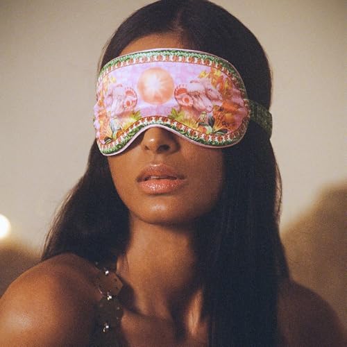 Silk blackout sleep mask used for a dark, low-effort evening reset after a late day.