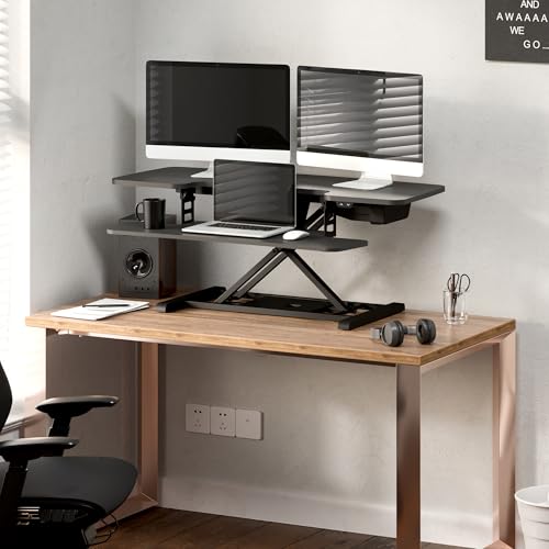 Image of FLEXISPOT 42 inch Electric Motor Desk Converter, Height Adjustable Motorized Stand up Desk Riser with Quick Release Keyboard Tray, Black Monitors and Laptop Workstation