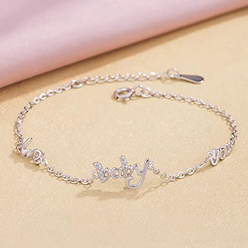 Bracelet en argent 925 sterling pour femme orné de petites breloques élégantes