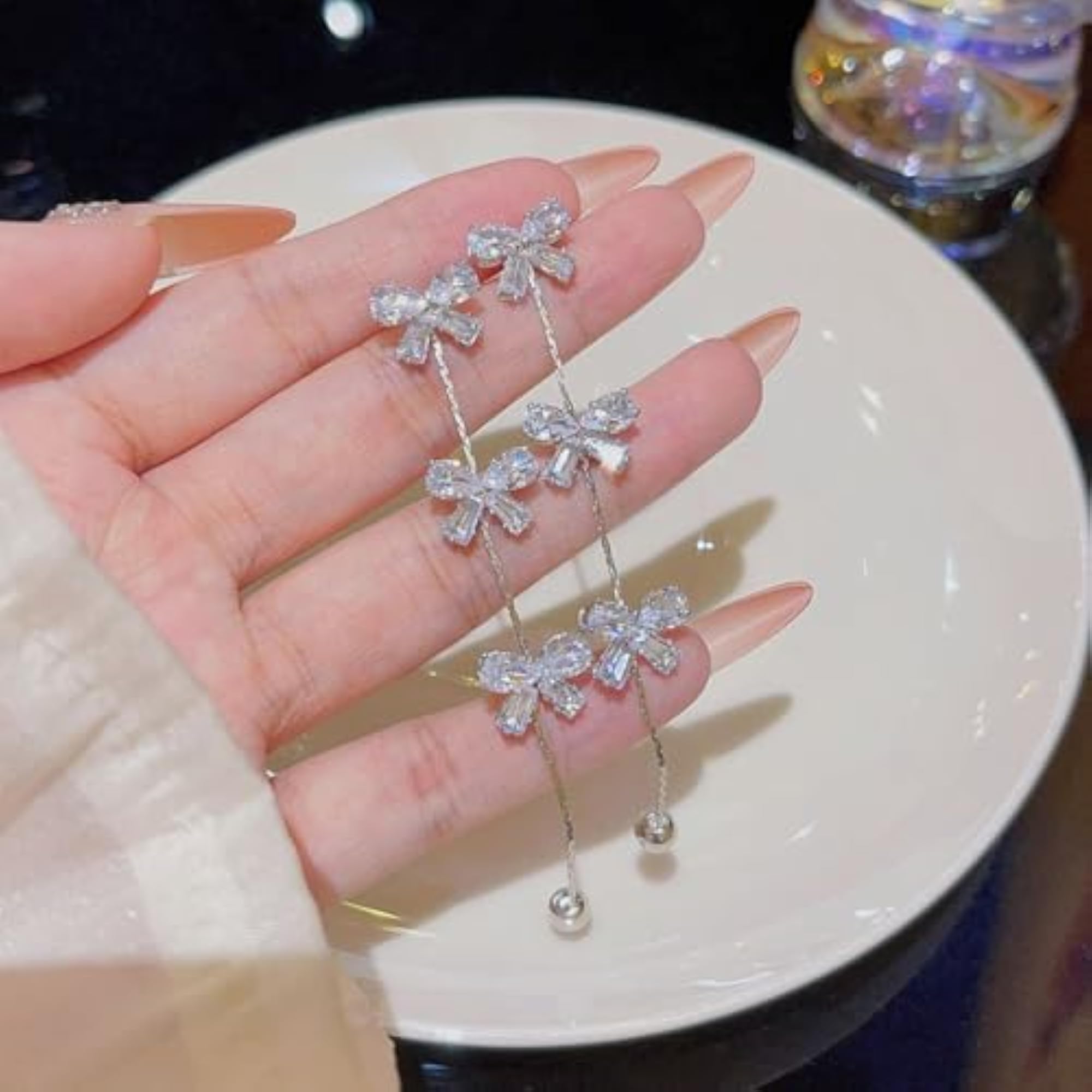 Women's Silver Bow Dangle Earrings