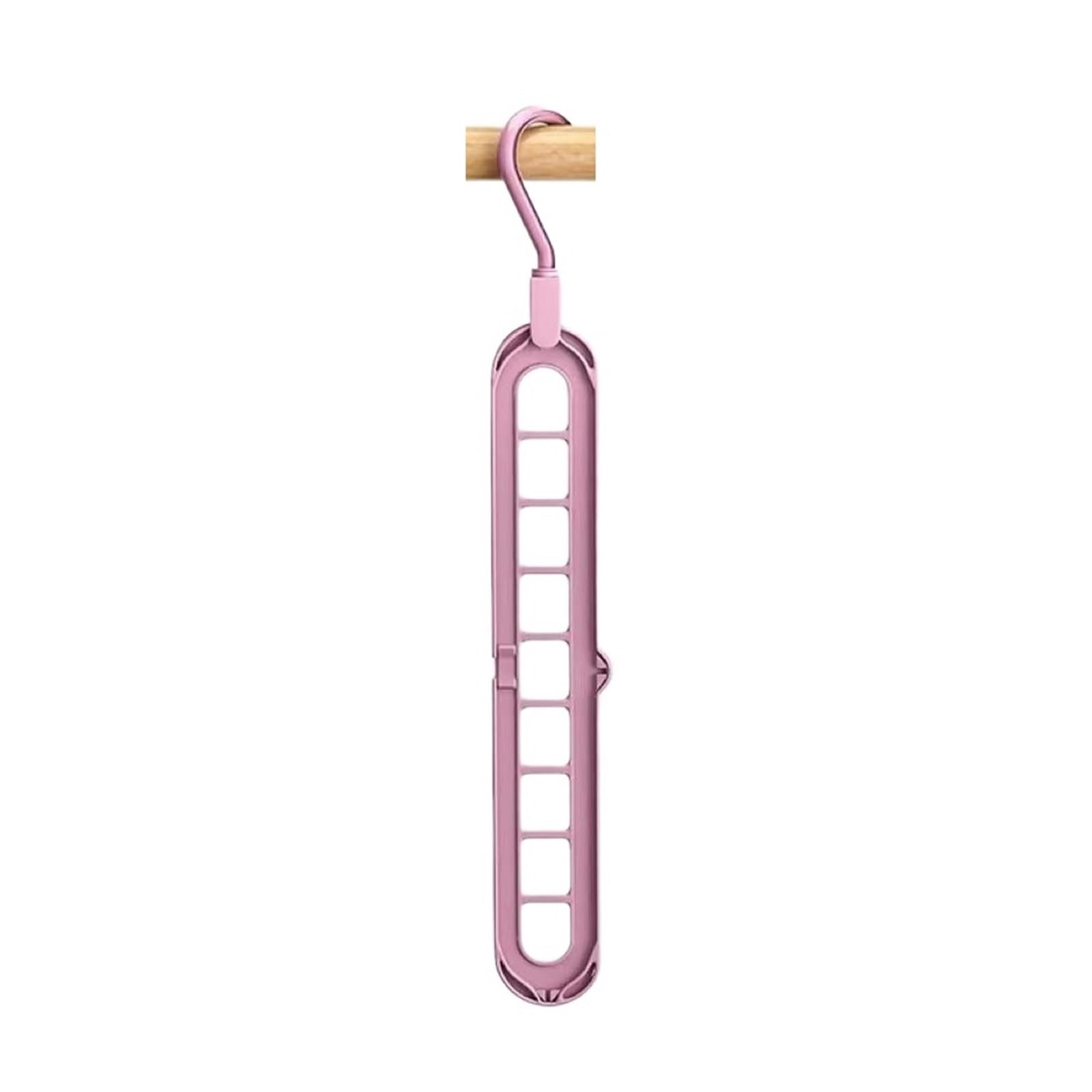 Cintre pour vêtements dans la garde-robe : rangez vos chemises avec ce support rose pliable