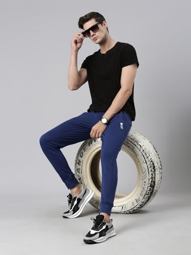 Image of BUZZ Standard Men Athleisure Slim Fit Solid Cotton Joggers Zipper Pockets, Ultra Soft, Stretchable, Breathable, Anti-Slip Waistband with Drawcord, Track Pants for Leisure, Travel, Workout. Pack of 1