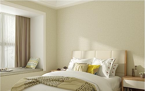 Papier peint intissé jaune pour masquer les défauts du mur de chambre