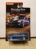Matchbox 2018 Mercedes-Benz Collection - 4 Door CLS500 Coupe in Matte Gold Finish on Night-Themed Art Card
