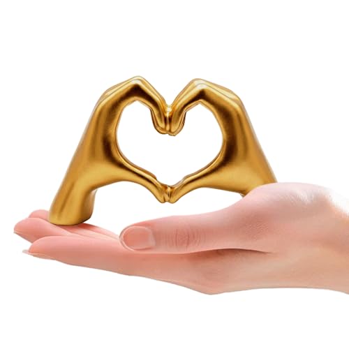 Escultura pequeña manos corazón dorada
