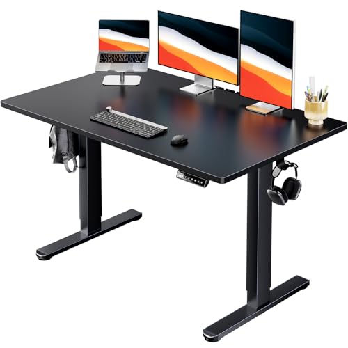 HUANUO Electric Standing Desk, 48″ x 30″ Whole Piece Desktop, Adjustable Height Computer Desk, 4 Height Memory Settings, Sit Stand Up Desk for Home Office, Black