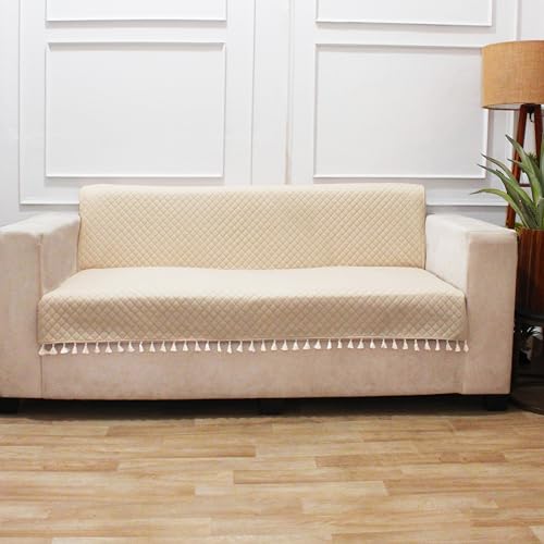 Image of STITCHNEST 'Maison Plush Series' Quilted Velvet Sofa Cover 1 Seater Fully Covered | Premium Soft Fabric, Washable & Fade Resistant | Beige Sofa Protector with Tassels | Size 24x60 Inch
