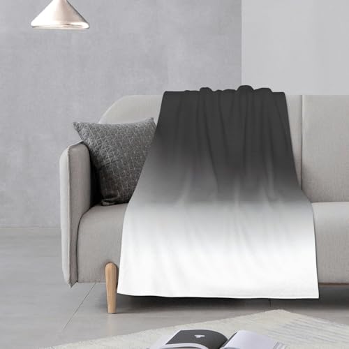 Couverture pour canapé douce qui réchauffe les soirées fraîches d'automne