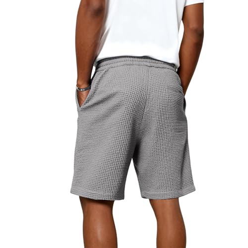 Short avec poches latérales en tissu gaufré mode