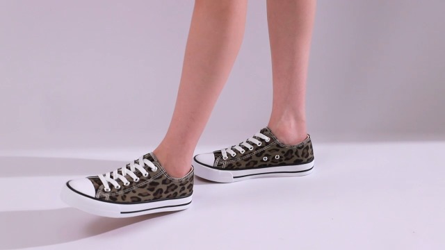 green leopard print trainers