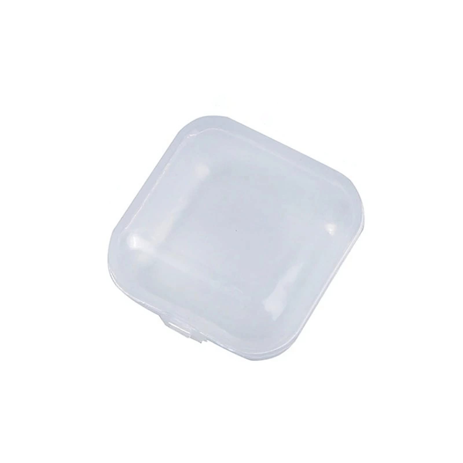 Mini boîte de rangement transparente pour trier vos boucles d'oreilles sur la coiffeuse