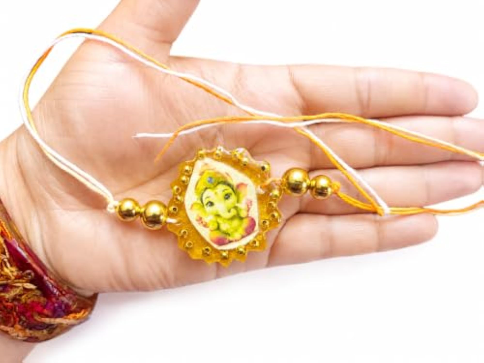 Ganesha Rakhi with Gold Beads and Orange Thread, Raksha Bandhan Gift