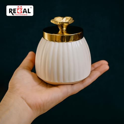 Image of Premium Metal Decorative Jar with Golden Brass Knob | Elegant Tabletop Storage Jar for Kitchen & Home Decor | 4 Inch Wide | Luxury Modern Design (White & Gold)