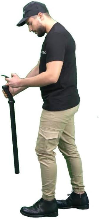 Person using the GROUNDTECH GR3 Plus metal detector with a smartphone