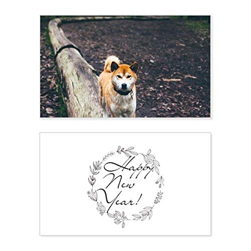 Tarjeta de felicitación de Año Nuevo con perro japonés pintado a mano