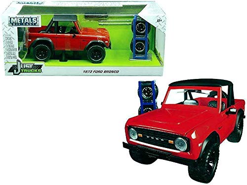 1973 Ford Bronco Red with Matt Black Top and Extra Wheels Just Trucks Series 1/24 Diecast Model Car by Jada 30518